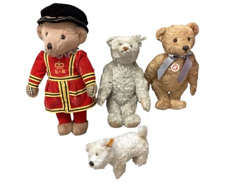 A collection of Teddy Bears. To include three Steiff  and one Burberry example. 