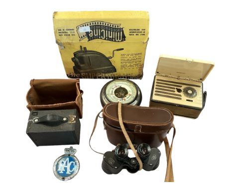 A boxed MiniCine projector, a pair of Ross of London binoculars, a box Brownie camera , barometer and an RAC badge etc.