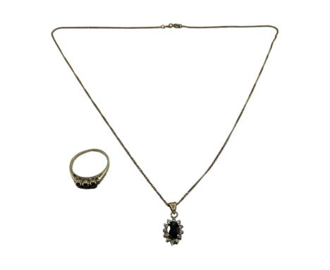 A 14ct gold sapphire and diamond ring with diamond accents together with a 9ct gold chain and sapphire and diamond pendant in