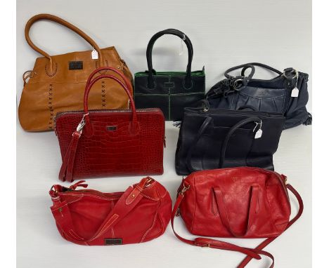Seven handbags, to include 6 Osprey. (2 original Osprey dust bags) and 1 Fossil (Fossil with original dust bag) All in used c
