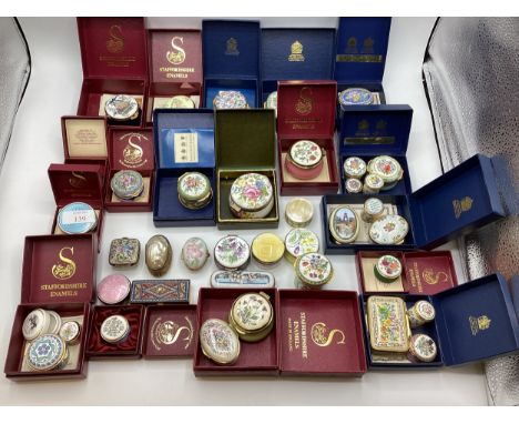 A large collection of Limoges, past times ,Staffordshire enamels and engine turned white metal boxes , many in original outer