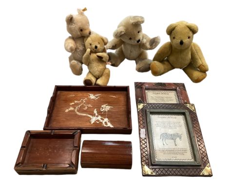 A Steiff growler Teddy Bear together with three others , Canterbury bears, Edwards, Deans together with two wooden picture fr