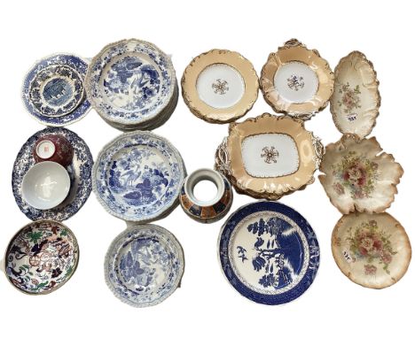 A mixed collection of blue and white and oriental style ceramic items. 