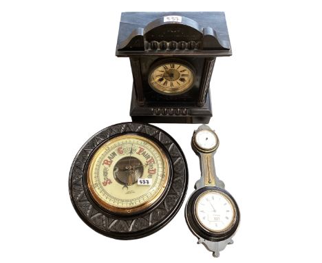 A slate mantle clock together with two wall barometers 