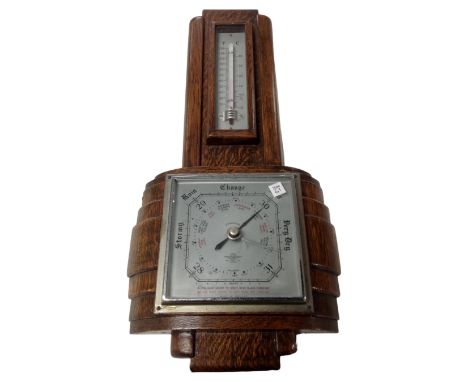 An oak cased Art Deco barometer.