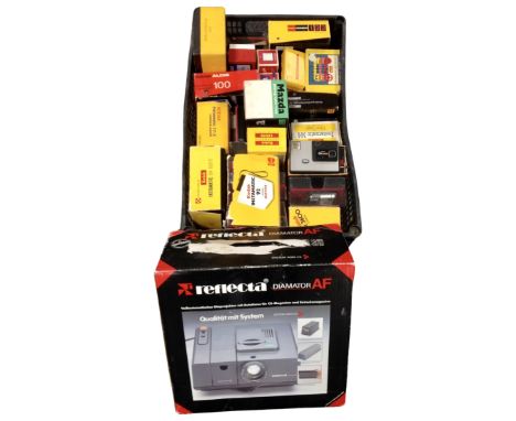 A box containing boxed vintage camera equipment including Kodak outfits and cameras and a Reflecta Diamator AF slide projecto