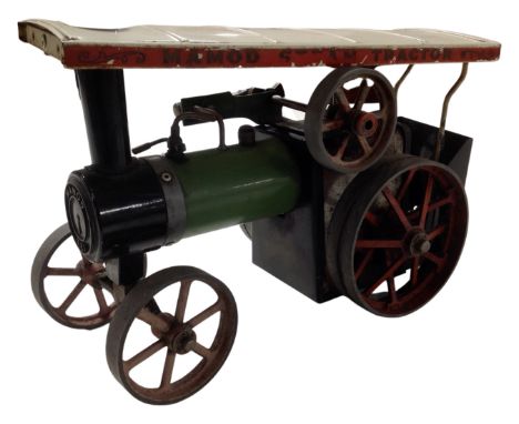 A Mamod steam tractor.