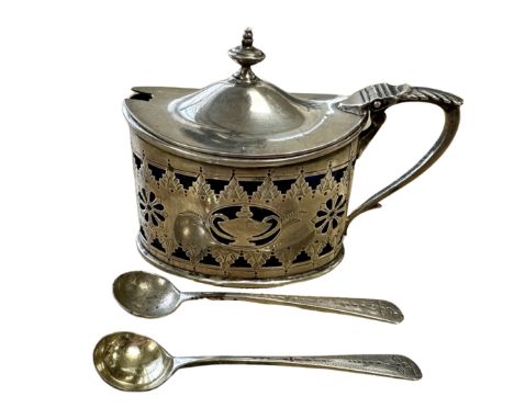 A silver mustard pot, Harrison Brothers and Howson, Sheffield 1903, together with two silver salt spoons.