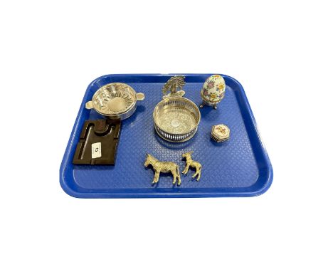 A brown Bakelite RAFA ashtray, Arthur Price coaster, two metal donkey figures, Peacock ornament, egg pin cushion, cherub trin