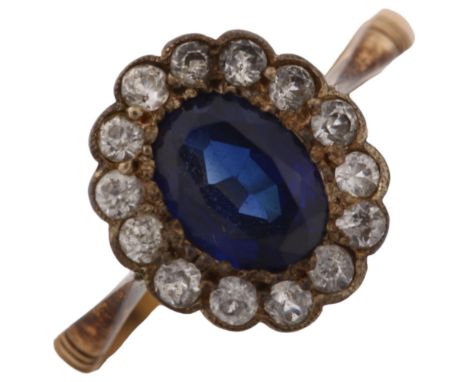 A 9ct gold synthetic sapphire and white sapphire cluster ring, setting height 11.6mm, size N, 1.7gNo damage, all stones prese