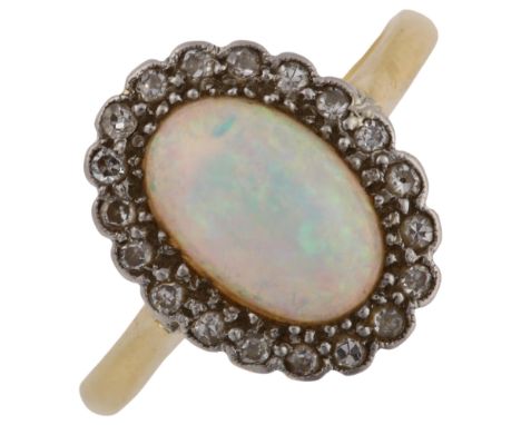 An 18ct gold opal and diamond cluster ring, platinum-topped set with oval cabochon opal and single-cut diamonds, opal measure