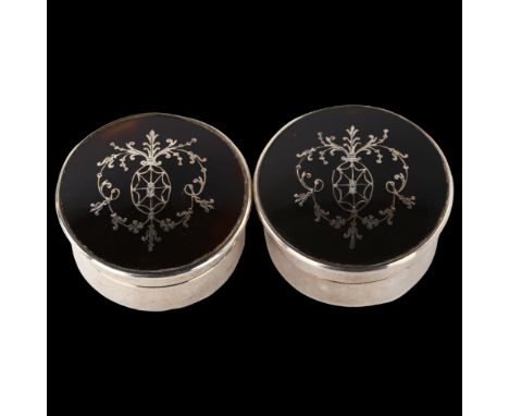 A pair of George V silver and tortoiseshell dressing table boxes, cylindrical form with pique inlaid tortoiseshell panels, by