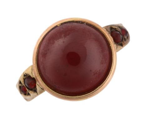 An Antique garnet dress ring, unmarked gold closed-back settings with round cabochon garnet, setting height 13.9mm, size N/O,