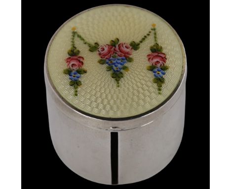 An Art Deco American sterling silver and enamel postage stamp dispenser box, with hand painted rose sway decoration, diameter