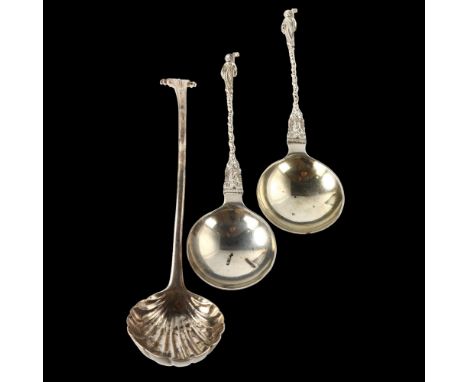 An Antique Irish silver shell sauce ladle, and a pair of silver Apostle spoons, ladle length 20cm, 5.3oz totalLadle handle ha