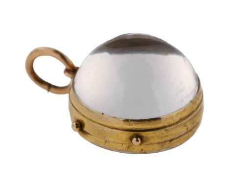 A 19th century gold-mounted rock crystal 'Pool of Light' orb locket pendant, with cabochon front and flat back, pendant diame