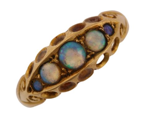 An early 20th century 18ct gold graduated five stone opal half hoop ring, set with round cabochon opal, maker's marks H and S