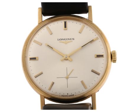 LONGINES - a 9ct gold mechanical wristwatch circa 1972, silvered dial with gilt baton hour markers and crosshair subsidiary d