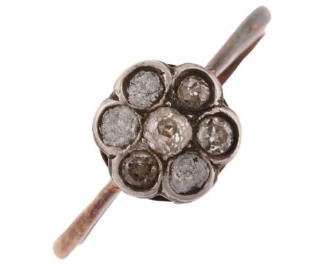 An 18ct gold diamond flowerhead ring, set with old-cut diamonds, setting height 8.3mm, size N, 2.1g3 stones are missing and h