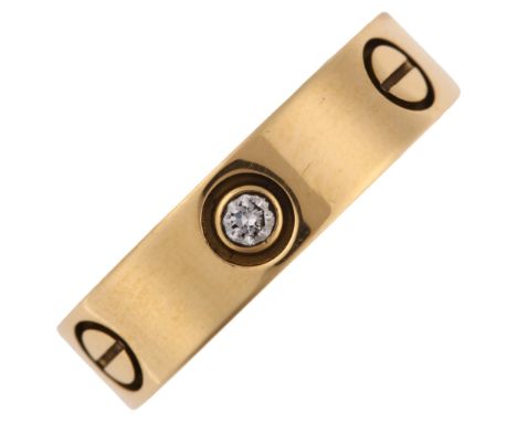 CARTIER - an 18ct gold diamond 'LOVE' band ring, with screw-head motif and modern round brilliant-cut diamonds, signed Cartie