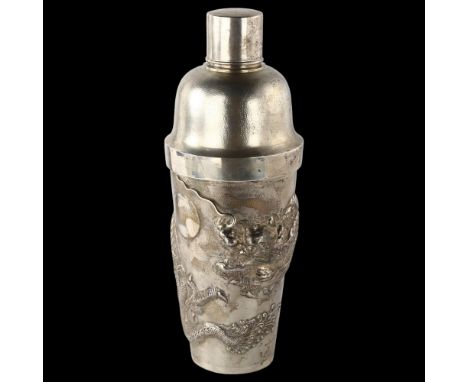 A large Chinese silver 'dragon' cocktail shaker, with high relief embossed dragon decoration, by Star Co, circa 1920, height 