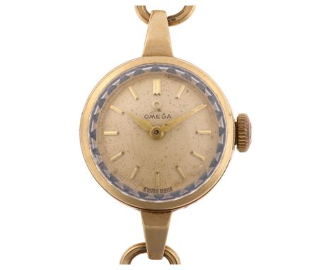 OMEGA - a lady's 9ct gold mechanical bracelet watch, ref. 66803, circa 1959, silvered dial with gilt baton hour markers, 17 j
