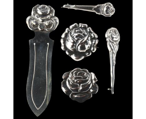 A Danish Art Nouveau silver rose jewellery set, comprising 4 brooches and 1 bookmark, bookmark length 10cm, 17.5g total (5)No