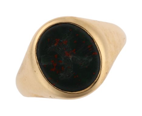 An early 20th century 18ct gold bloodstone 'Double Headed Eagle', seal signet ring, set with oval intaglio carved bloodstone,