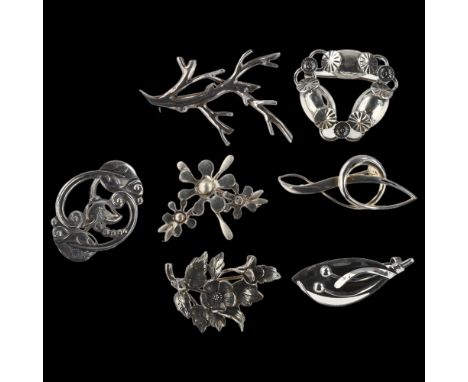 7 Scandinavian silver floral brooches, maker's include John Lauridsen, largest length 55.8mm, 46.5g total (7)No damage or rep