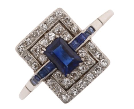 An Art Deco sapphire and diamond cocktail panel ring, unmarked white metal settings with rectangular step and calibre-cut sap