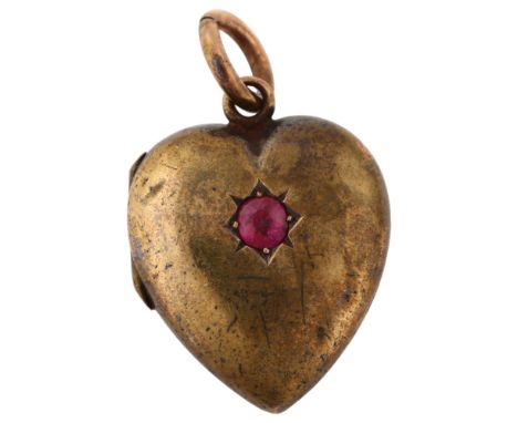 A Victorian 15ct gold ruby heart locket pendant, pendant height 27.5mm, 3.7gPendant has several very light dents, hinge worki