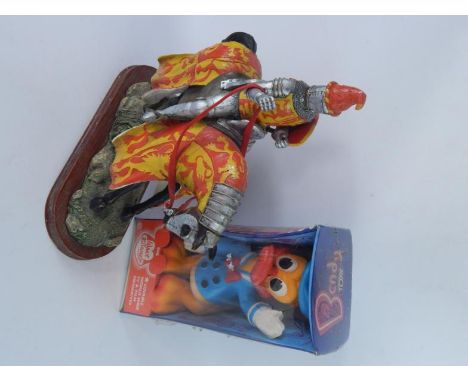 A plaster model of a jousting knight, huntsman fox, radio controlled Porsche K-3, Walt Disney Bendy Toys Donald Duck, Totopol