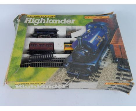 A Hornby Dublo gauge Highlander electric train set, Smokey Joe tank engine, rolling stock and accessories, and a Lima British