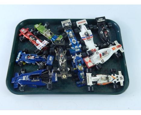 A collection of diecast Formula 1 vehicles, including Dinky, Corgi, etc, teams including Lotus, Tyrell, Yardley McLaren, Hesk