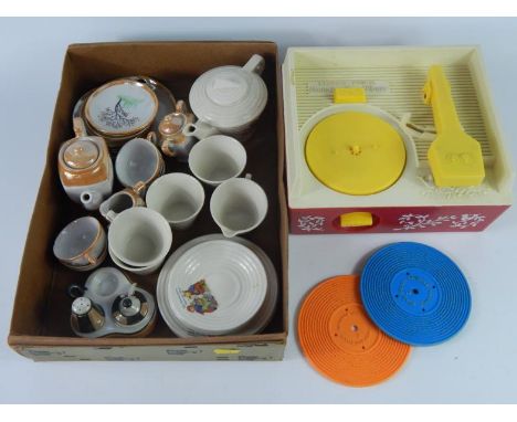 A 1930's child's part tea service decorated with Little Red Riding Hood, Japanese lustre part child's tea service, and a Fish