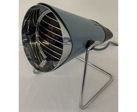 A vintage Philips infrared heat lamp, in working order. Chrome stand and lamp shade with painted blue exterior and matching b
