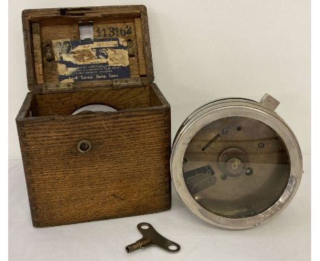 A vintage Coulet Excelsior pigeon clock with key. In working order. Complete with wooden carry case. 