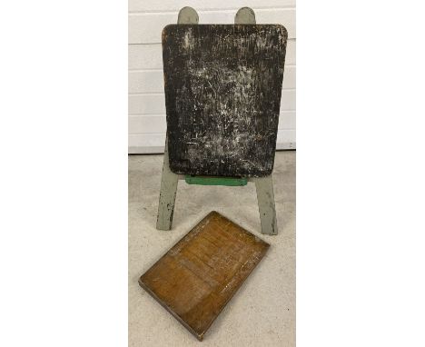 A vintage wooden child's blackboard easel together with a wooden shove ha'penny board.  