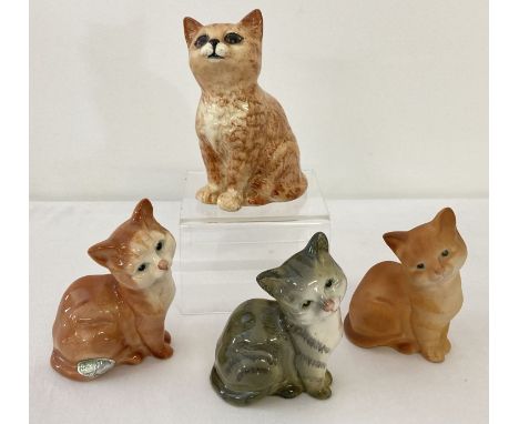 4 small Beswick ceramic cat figurines. A Persian kitten model No. 1886 in ginger stripe gloss finish  together with 3 small k