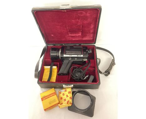 A vintage Chinon 1072-S Deluxe cine camera and accessories in original case.  