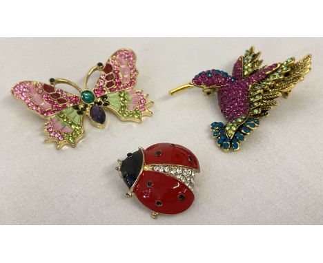 3 enamel and stone set costume jewellery brooches in the form of insects &amp; a bird. A butterfly, a ladybird and a humming 