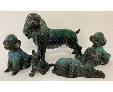 5 Blue Mountain ceramic dog figurines in varying sizes. To include poodles, a spaniel, terrier and setter. Largest approx. 27