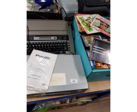 PACIFIC VIDEO RECORDER PANASONIC ELECTRONIC TYPEWRITER AND A BOX OF ASSORTED DVDS AND 45S RECORDS