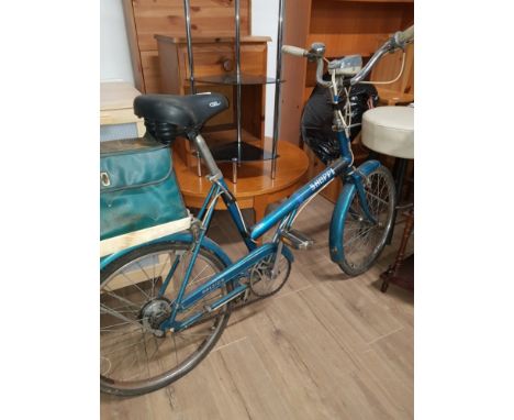 A VINTAGE RALEIGH SHOPPER BIKE