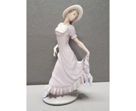 NAO FIGURE ELEGANT LADY HOLDING DRESS