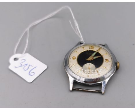 JUNGHANS HANDAUFZUGSUHR - silbernes Gehäuse, schwarz/weißes Zifferblatt mit goldenen Indices und arabischen Ziffern, kleine S
