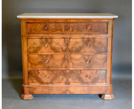 A 19th Century French Burr Walnut Commode, the variegated marble top above four drawers with circular knob handles raised upo