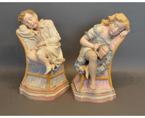 R J Morris, Parian Figures of Sleeping Children, Boy and Girl Upon Chairs, 32cm tall 