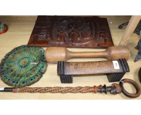 An African hardwood pillow, a walking stick and other ethnographic carvings etc