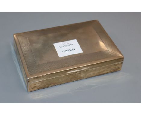 A modern silver engine turned cigarette case 15.9cm.